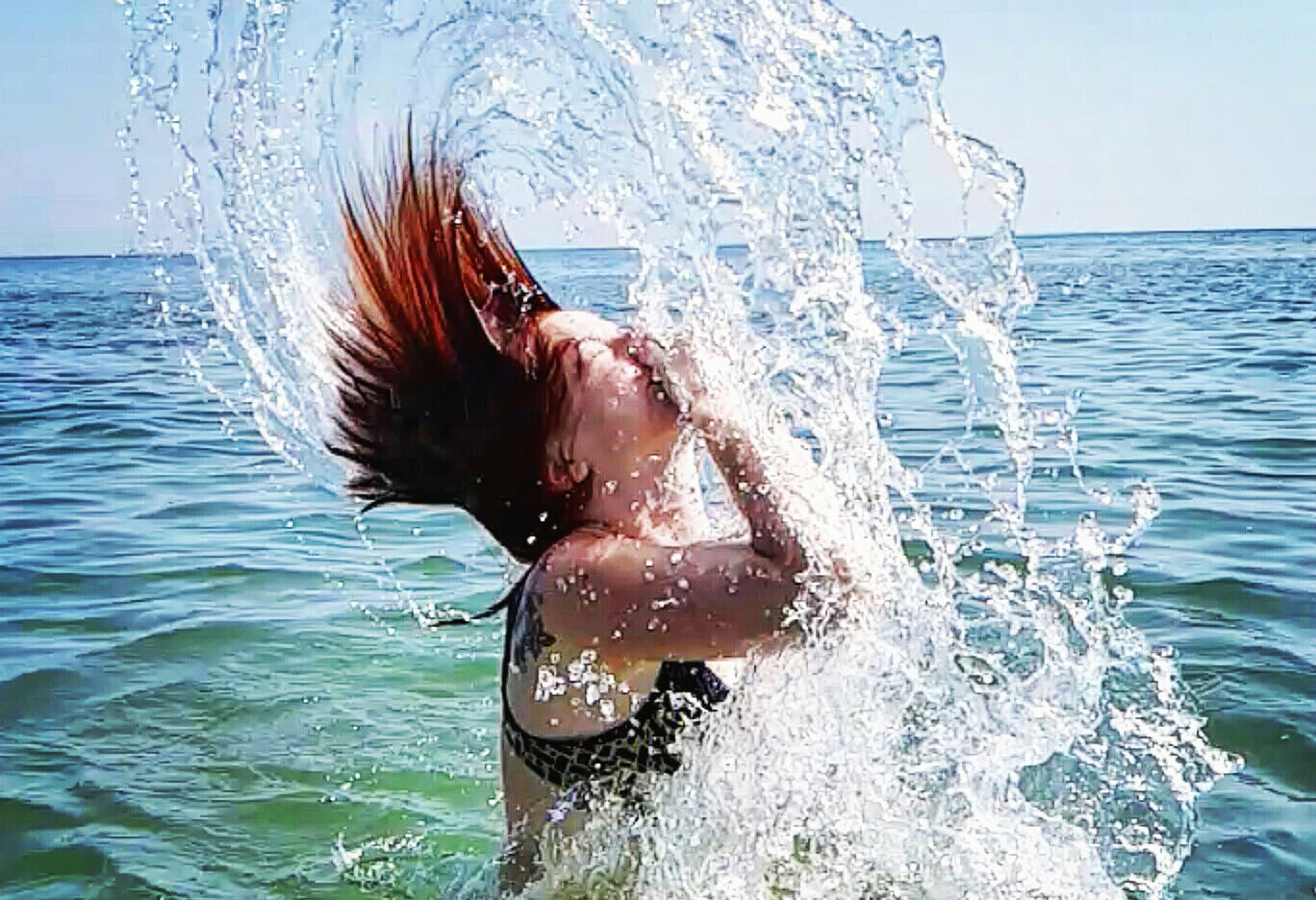 Foto Frau im Wasser